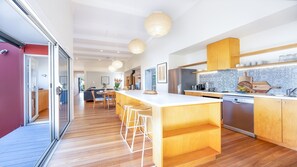 Buwarla House | Chef's Kitchen | Opening Out to the Deck