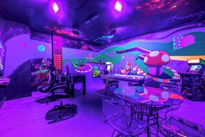 Race into fun in our glow-in-the-dark Mario Kart game room with Xbox and more.