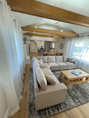 This warm great room provides breathtaking lake views and plenty of seating.