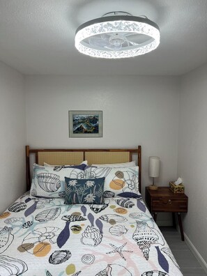 Boho queen bed with matching night stand, ceiling fan with de-humidifier option