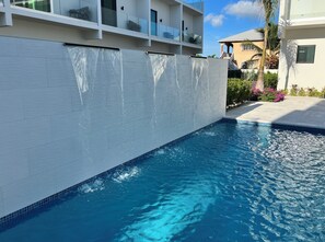 Waterfall feature adds to the allure of Seascape Townhomes a boutique getaway