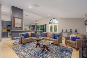 Step into this cottage retreat with resort vibes and contemporary flair.