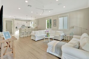 All villas feature a living room | Windows galore, white and bright coastal design +   comfy ample seating.