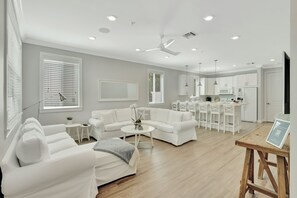 All villas feature a living room | Windows galore, white and bright coastal design + comfy ample seating.