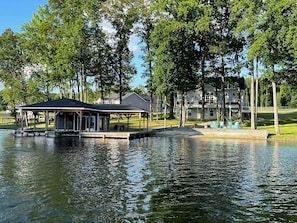 Lake view of the property / boat house & main house (photo taken on a boat)