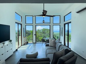 Relax in a beautifully lit, spacious living room.
