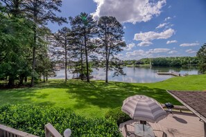 View of the lake and dock from one of the many outdoor seating options