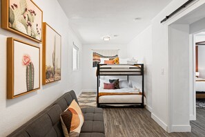 2nd Bedroom featuring 2 Queen beds (Bunk Bed Style) and a Futon.