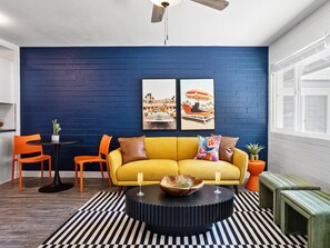 Relax in a bright and inviting living room, complete with cozy seating and a Smart TV, the perfect spot for unwinding after a day of exploration!