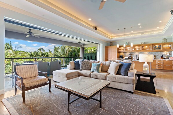 Open-concept living at Wailea Hoolei 93-3 with lush views and seamless indoor-outdoor flow.