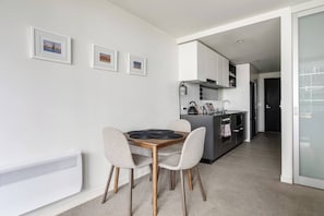 Enjoy meals at the dining table or use this space for setting up a laptop if you’re combining business and leisure stays.
 
