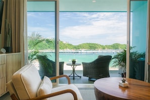 Living Room & Balcony with Santa Cruz Bay View