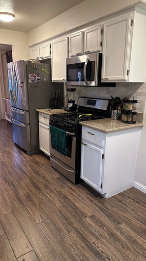 Fully equipped kitchen micro, fridge, ice maker, filtered water, oven, coffee ma