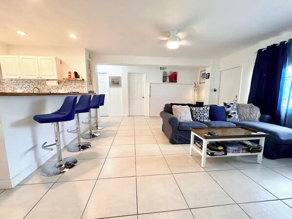 Open plan living room-kitchen-dining area