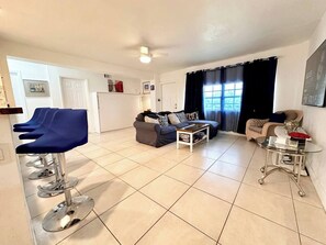 Open plan living room-kitchen-dining area