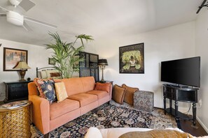 Step inside to a cozy living room filled with eclectic, timeless charm.
