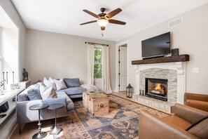 An inviting and comfortable seating area perfect for rest and relaxation. Grab a book or turn on the tv and tune into your ideal vacation. 
