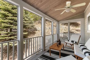 Catch a breeze on the cliffside four season porch 