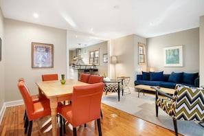 Embrace the open floor plan where laughter echoes from the dining area to the kitchen