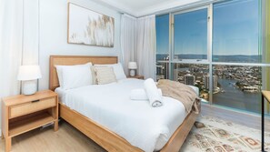 With floor-to-ceiling windows, you'll be able to float away on cloud-like mattresses as you fall asleep with the twinkling city lights sparkling below.