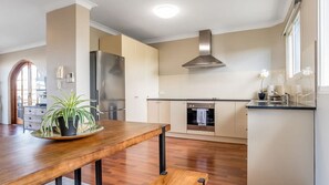 Cook up a storm in the fully-equipped kitchen which includes a fridge, oven, stove and many more.