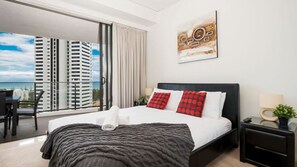 Featuring two bedrooms and two bathrooms, this modern apartment accommodates up to eight guests at a time across two queen beds, a bunk bed and comfortable sofa bed.