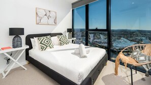 Featuring a king and queen-sized bed, our two-bedroom haven comfortably accommodates up to four guests.