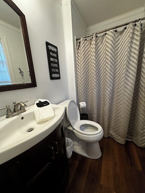 Master bathroom with shower.