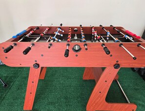 Kids can play all day on this full-size foosball table.