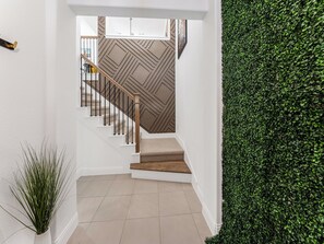 Modern meets nature in this striking hallway