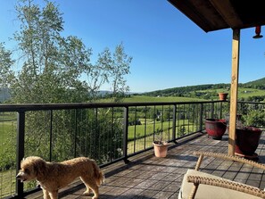 Part of wrap-around deck connecting the two outdoor dining spaces