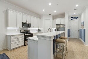 Fully Equipped Kitchen with Extra Seating at Bar
