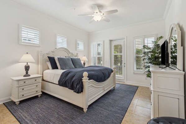 Primary Bedroom with King Bed and Screened-In Porch Access
