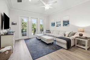 Large Couch with Chaise and Direct Access to the Balcony