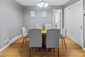 Dining table with 6 chairs and 4 folding chairs available for large groups!