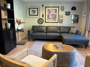 Enjoy a beautiful view of Ben Lomond Peak from the New leather sofa.