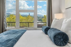 King Bedroom beautifully designed. 55"TV. Extremely comfortable with an attached bathroom and walk in closet.