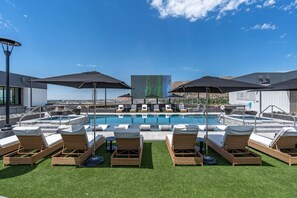 Rooftop swimming pool, 2 hot tubs and one HUGE JUMBOTRON for your entertainment.