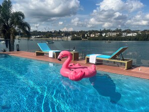 Sea View Pool: Includes poolside loungers and swimming toys.