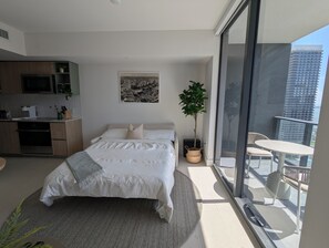 Bright Studio has a sofa bed, balcony access, and a modern kitchen.