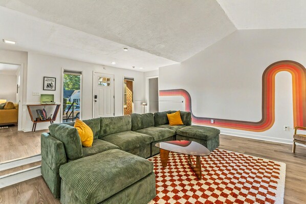 Large cozy couch that can also be used as a bed. Room includes air purifier. 