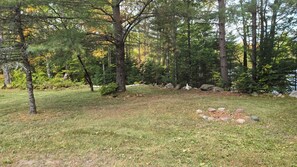 Yard and fire pit Infront of cabin