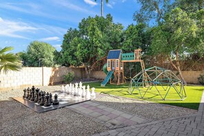 Adventure awaits! Checkmate with our giant chess set, then let the kids explore the playground and climbing dome!
