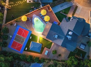 Twinkling lights and nighttime vibes! Our backyard shines brightly from above