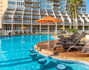 Relax in on of the poolside sun loungers