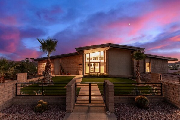 Welcome to your retreat! The front entrance invites you in with a warm and inviting ambiance.