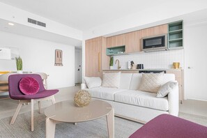 Relax in style – this cozy living room is the perfect spot to unwind and enjoy your favorite shows.