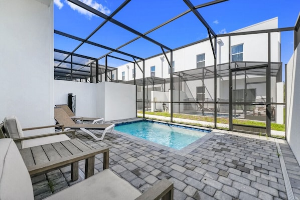 Enjoy your own private oasis with a fully fenced pool for ultimate relaxation and security.