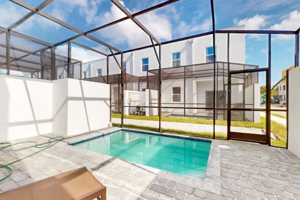 Unwind in your private, fully fenced pool under the Florida sun.