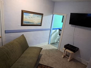 Relax in the comfortable living room with a large Smart TV